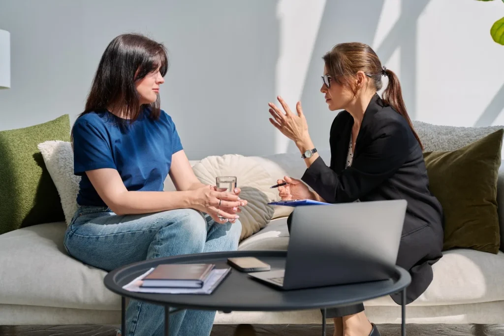 Two people talking in counselling session